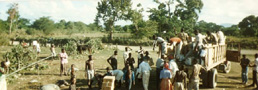 Villagers receiving supplies and food